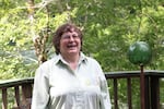 Shelley Ryan stands on the back porch of Daybreak Haven Bed & Breakfast.