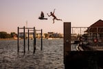 A boy jumps into the Chao Phraya river during a heatwave in Bangkok, Thailand, on February 22, 2024. This image recalls the free feeling of leaping from several times one’s height into water as a child to escape the summer heat. The boundless energy to repeat the feat over and over again as your friends laugh and cheer you on. A time many of us might remember as one when we felt truly whole and at peace, even if life wasn’t perfect. It’s always worth realizing that this version of ourselves still exists somewhere inside, and to let that lend us a sense of well-being that can never be taken away.