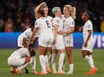 U.S. players react following their loss to Sweden in a penalty shootout during the Women's World Cup round of 16 soccer match in Melbourne, Australia, Sunday, Aug. 6, 2023.
