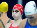 Zhang Yufei, of China, competes during a heat in the women's 100-meter butterfly at the 2024 Summer Olympics on Saturday in Nanterre, France.