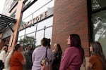 People wait in line to shop at Hidden Worlds bookstore on Saturday, Sept. 19, 2026.