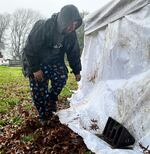 Gordon Muma Jr., moves his campsite of nearly two years near the off-ramp of the Ross Island Bridge. 