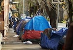 FILE: There were 582,462 people sleeping on the streets of the U.S. during a single night in January this year, according to the U.S. Department of Housing and Urban Development — a 0.3% increase since 2020.