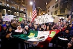 People cheer during a rally to oppose President Donald Trump's executive order barring people from certain Muslim nations from entering the United States, Sunday, Jan. 29, 2017, in downtown Seattle.