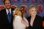 June Lockhart, right, played the character of Ruth Martin, mother of Timmy Martin, played by Jon Provost, left, during the classic series "Lassie." The two are seen with Lassie, 9th generation, during a 2003 CBS anniversary celebration in New York.