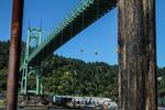 Protesters hung from the St. John's Bridge Wednesday in protest of Shell's Arctic drilling efforts.