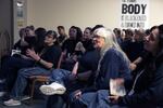 Patty Turner (center) and the rest of the audience sing along with "Long Black Veil."