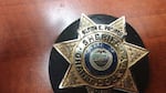 Grant County Sheriff Glenn Palmer's badge, after it was found by a UPS driver in the highway on May 28, 2019, and returned to the sheriff.  