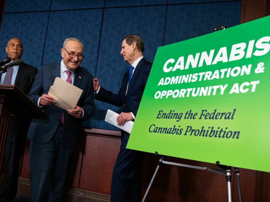 Senate Democrats hold a press conference on Wednesday pitching new, less strict marijuana laws. From left are Senators Cory Booker of N.J., Majority Leader Chuck Schumer of N.Y., and Ron Wyden of Oregon.
