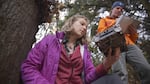 Seattle University senior Diana Jacobsmeyer (left) and professor Mark Jordan record camera data along the Duwamish River