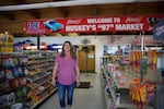 Carey Hughes is the owner of Huskey's 97 Market, the lone grocery store in the town of Moro, Oregon. She says most of her regulars are ranchers and farmers, who have been busy fighting the Substation Fire.