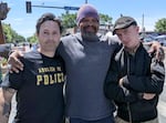(Left to right) Jon Bair, Mic Crenshaw, and Micah Fletcher at George Floyd Square in Minneapolis, Minn., in May 2021, a year after Floyd's murder.