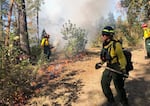 A fire boss and trainees carry out a controlled burn outside of Eugene in Oct. 2021. These limited and contained burns are to deprive fuel for larger fires, and rejuvenate certain habitat.