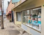 A display that's part of Prosper Portland's Window Stories in an empty storefront on Southeast Hawthorne on Dec. 28, 2023.