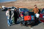 Syrians who have been refugees in Turkey arrive at the Turkey-Syria border crossing near the Turkish town of Antakya as they return to their homeland. Some 3 million Syrians have been living in Turkey.