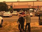 Evacuees from the Santiam Fire are gathering at the state fairgrounds in Salem, where county officials and the American Red Cross have established an aid center.