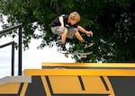 Seattle skateboarder Nels Rosen, 14, practices for the Rockstar Energy Open in Portland, Ore., Aug. 14, 2025. 