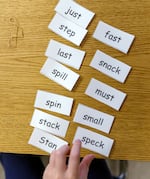 A student sorts words that have consonant blends in Coral Walker’s first grade class.