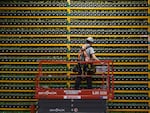 A technician inspects the backside of bitcoin mining at Bitfarms in Saint Hyacinthe, Quebec, Canada on March 19, 2018. There's also considerable debate about how the halving will impact the amount of energy involved in bitcoin mining.