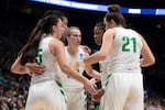 Oregon Ducks basketball players huddle during the first half of an NCAA Tournament game against South Dakota State on Friday, March 29, 2019, at Moda Center in Portland, Ore. Oregon won 63-53.
