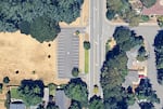 An overhead view of the parking lot just north of the home where Harriet Thompson was killed in March 1998. Former newspaper carrier Janelle Tomason told OPB she was in this parking lot when she saw a white man running north along 12th Street southeast around the time of the murder.