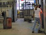 Workers at the Uroboros Glass factory before its closure.