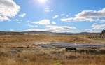 Irrigation equipment and cattle frame sit in open Eastern Oregon country in Malheur County in this 2021 file photo.