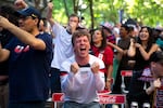 Evan Tracy, 25, reacts after a USA goal during a FIFA World Cup game against Paraguay, televised in Occidental Park on Friday, June 12, 2026, in Seattle’s Pioneer Square neighborhood.