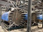 Electrolyzers fill a pair of warehouses in the desert near Delta, Utah. The machines make hydrogen by splitting water molecules.