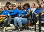 Portland Association of Teachers President Angela Bonilla, in black jacket, sits with other PAT members during the Portland Public Schools Board of Education special meeting.