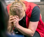 Julie Kleese, RN, cries after sharing her experiences as an ICU nurse at OHSU Hospital in Portland, Ore., Aug. 18, 2021.