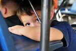 Child participates in earthquake drill