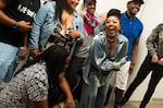 Miesha Wilson-Harris Love, who goes by Magik9 on stage, celebrates after her performance.