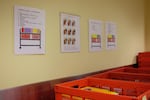 Crates and charts help organize books that are traveling around the Multnomah County library system.