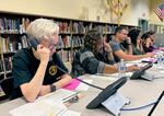 Gov. Tina Kotek joins more than a dozen volunteers at Waldo Middle School in Salem, Ore., on Oct. 15, 2024, for a phone bank event to raise awareness around regular school attendance.