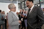 Oregon Gov.Tina Kotek, left, talks with Benjamin Berry, chair of the board of trustees at Portland State University, before a press conference at the Jordan Schnitzer Museum of Art, in Portland, April 2, 2024. 