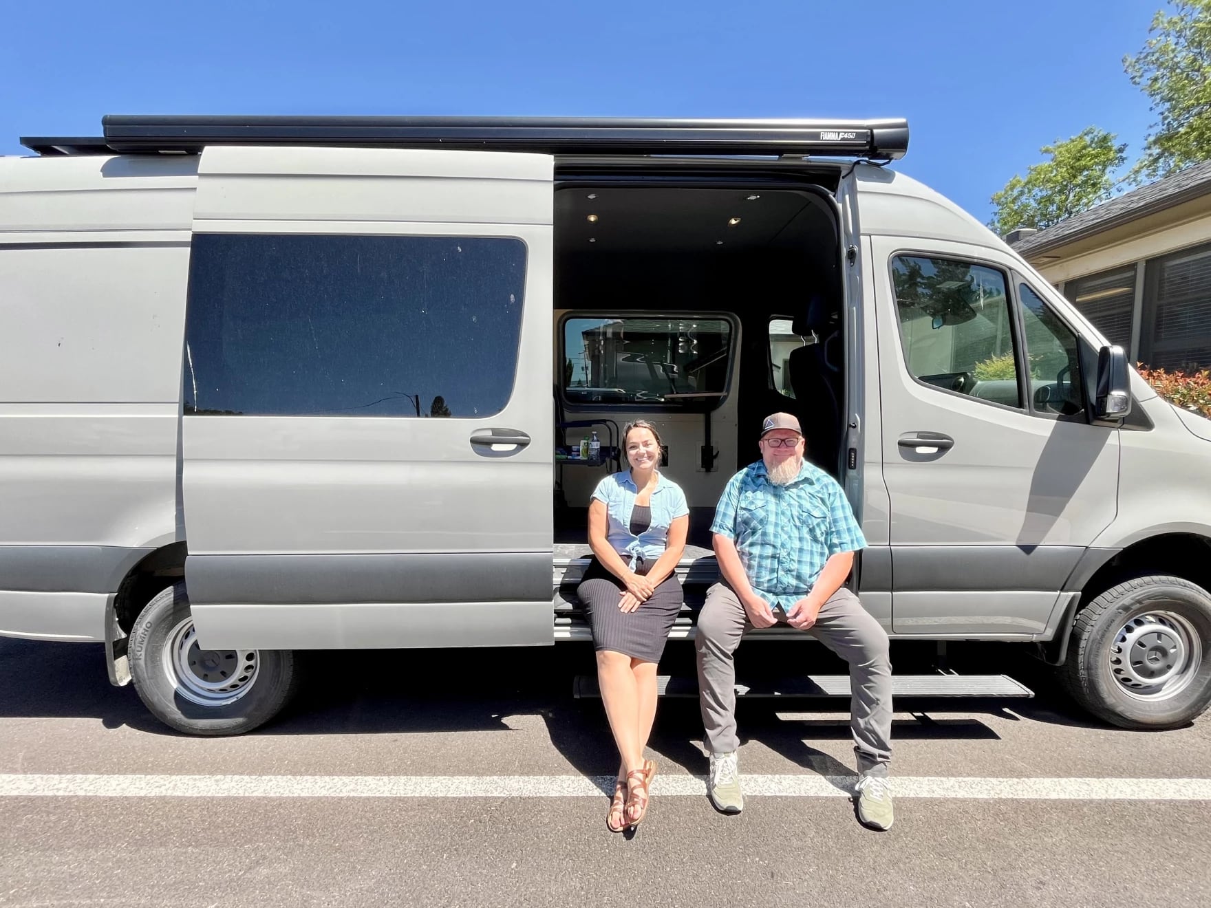 Erin Zelinka, development officer, and Matt Northrop, program director, in Maslow Project's new mobile van.