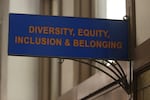 FILE - The sign above the door to the Office of Diversity, Equity, Inclusion and Belonging inside the main administration building on the main University of Kansas campus is seen on April 12, 2024, in Lawrence, Kan. While some universities in the United States are shutting down diversity offices and eliminating equity-related groups after the second Trump administration began in January 2025, Oregon’s institutions are largely standing their ground.