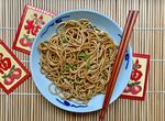 A bowl of ginger-scallion lo mein — longevity noodles for Lunar New Year