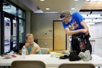 Rory Lidster, 55, right, and Amanda Marshall, 41, unpack after checking into a cooling center in Portland, Ore., Tuesday, July 26, 2022. Temperatures are expected to top 100 degrees F on Tuesday and wide swaths of western Oregon and Washington are predicted to be well above historic averages throughout the week. "I don't know how long they're going to be doing this, but I hope it's for a little while. As long as we can be, I will be here," Lidster said. 