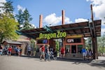 People line up to enter the Oregon Zoo on June 28, 2019, in Portland, Ore. The zoo opened in 1959 and is located in Washington Park.