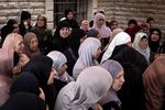 Mourners attend the funeral of 14-year-old Palestinian American Amir Rabee in the village of Turmus Ayya, in the Israeli-occupied West Bank, on Monday.