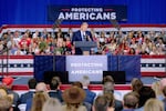 Republican U.S. Senate candidate Mike Rogers speaks during a Aug. 31 rally in Sterling Heights, Michigan. He has focused on the the trillions of dollars it would cost to put a Medicare for All healthcare system in place.