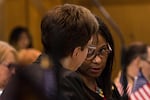 State Rep. Janelle Bynum, D-Clackamas, right, speaks with House Speaker Tina Kotek, D-Portland, on the floor of the House at the Capitol in Salem, Ore., Tuesday, April 2, 2019.