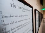 A copy of the Ten Commandments is seen along with other historical documents in a hallway of the Georgia Capitol on June 20 in Atlanta. Civil liberties groups filed a lawsuit on June 24 challenging Louisiana’s new law that requires the Ten Commandments to be displayed in every public school classroom.
