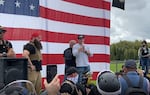 Chandler Pappas, center, speaks at a Proud Boys rally in Portland on Sept. 26, 2020. Pappas faces criminal charges for his role in a Dec. 21, 2020, attack on the Oregon state Capitol.