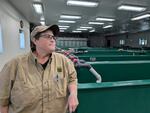 Klamath Hatchery Manager Gayle Mitchell stands inside the new hatchery building, June 5, 2026.