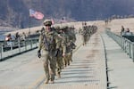 FILE - U.S. Army soldiers cross a floating bridge on the Imjin River during a joint river-crossing exercise between South Korea and the United States as a part of the Freedom Shield military exercise in Yeoncheon, South Korea, March 20, 2025. (AP Photo/Ahn Young-joon, File)