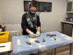 Veterinarian Dr. Laura Acevedo performs autopsies on salmonella-infected birds at the ThinkWild animal hospital in Bend, Ore., Feb. 1, 2021.