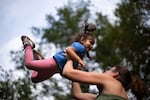 Rumley plays with her daughter after they finished work and daycare for the day. She loves being outdoors, and teaches Lorelei to appreciate nature too.